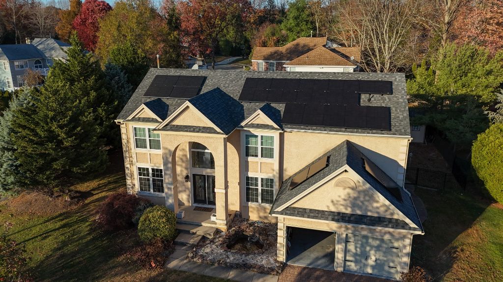 Aerial drone view of a completed Velocity Energy solar installation on a South Jersey home